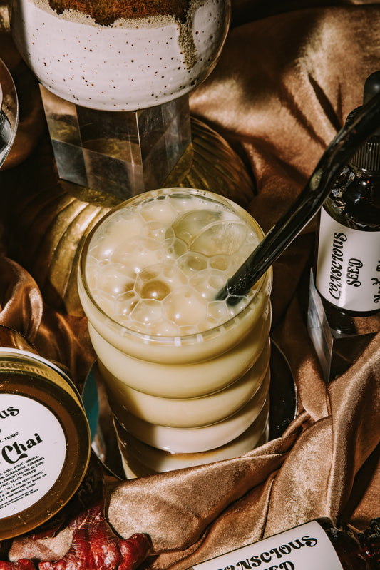 Herbal Kava Chai concentrate crafted into a latte with Ayurvedic spices and kava root for stress relief. A socially relaxing beverage.