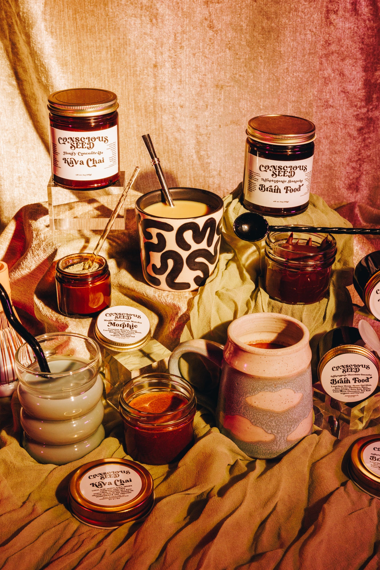 Hot cups of Kava Chai instant herbal concentrate mixed with milk and honey for a cozy, caffeine-free ritual.