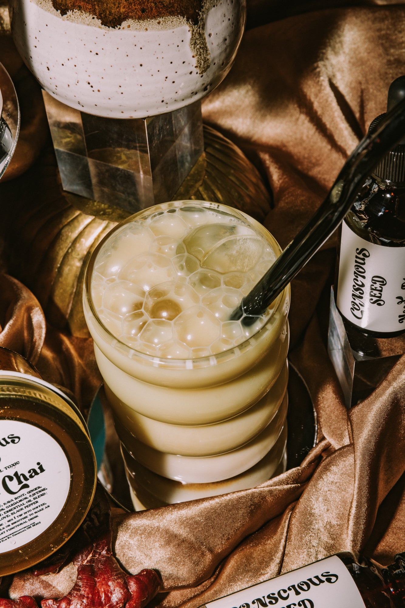 Herbal Kava Chai concentrate crafted into a latte with Ayurvedic spices and kava root for stress relief. A socially relaxing beverage.